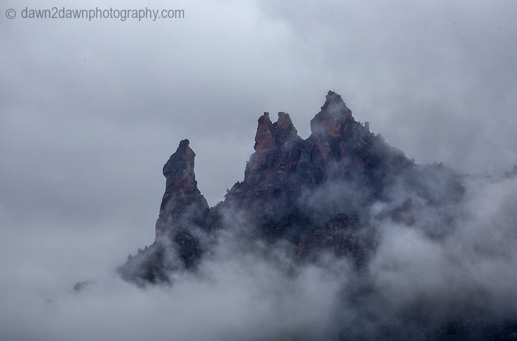 Passing storms bring rain and fog to the Eagle Crags just outside Zion National Park, Utah