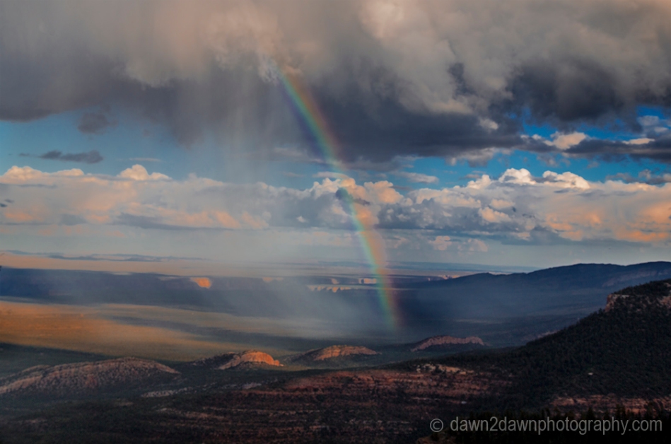 A rainbow appears during a monsoonal thunderstorm near the Grand Canyon in Northern Arizona
