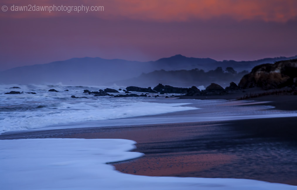 The sun rises over the Pacific Ocean at Cambria, California