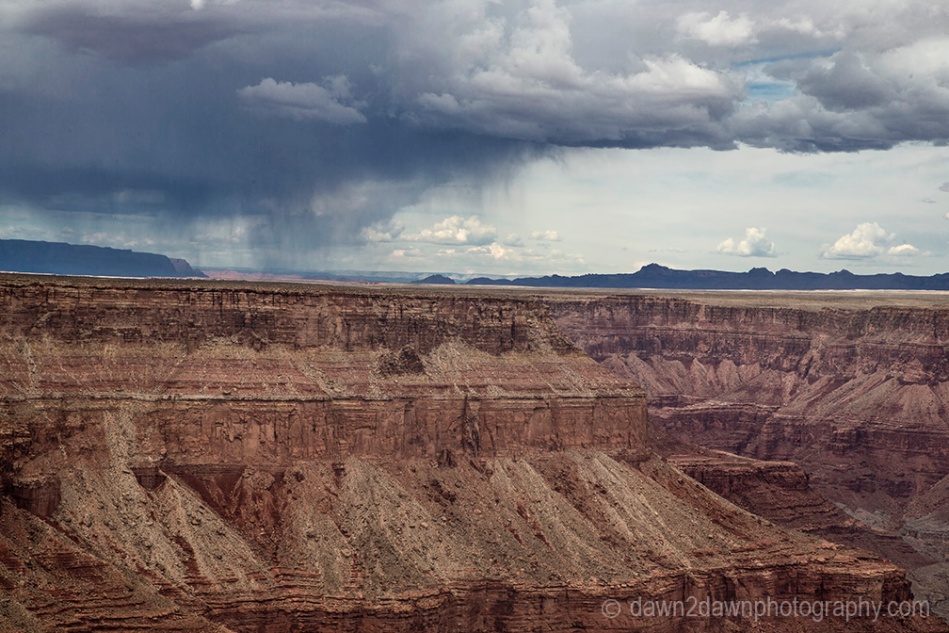 A thunderstorm passes along Marble Canyon at Grand Canyon National Park, Arizona.