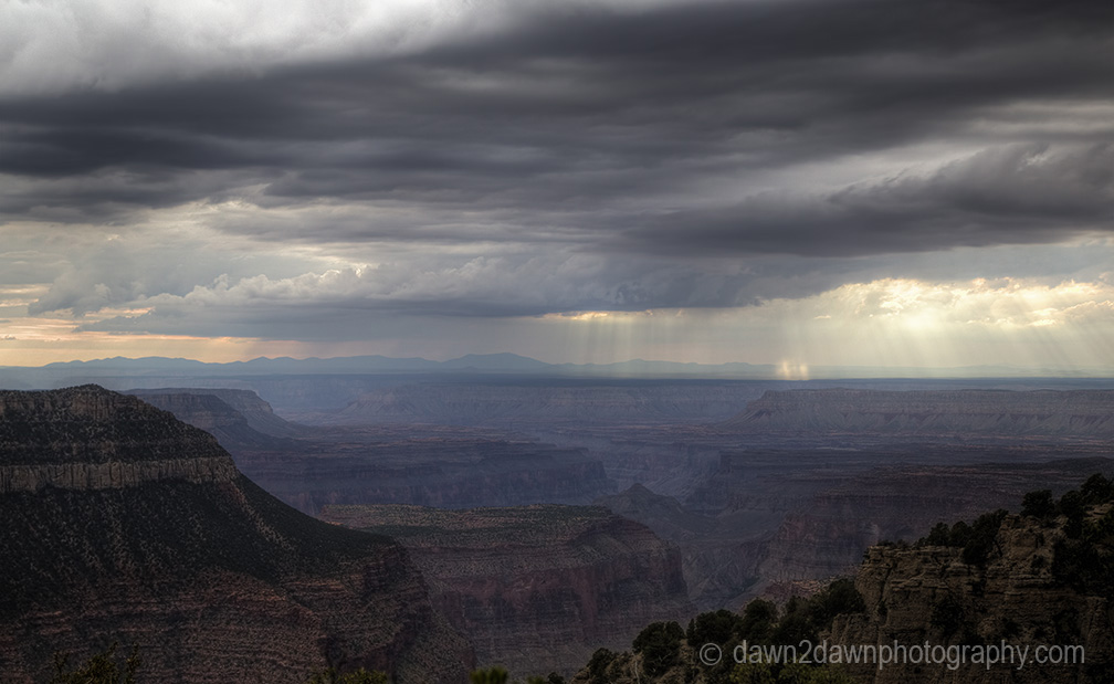 Storm clouds pass over the Grand Canyon near Timp Point, Kaibab National Forest, Arizona