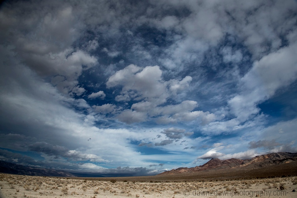 Threatening clouds pass over Eureka Valley at Death Valley National Park, California